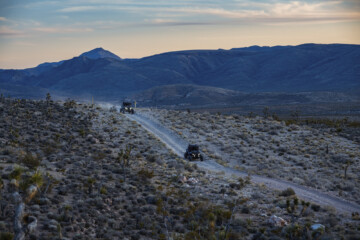Dusk-2-vehicles-driving-down-hill-getting-darker-5.2024