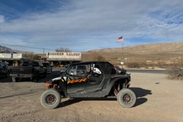 RZR-IN-FRONT-OF-PIONEER-IN-LOT-ACROSS-2.16.2025